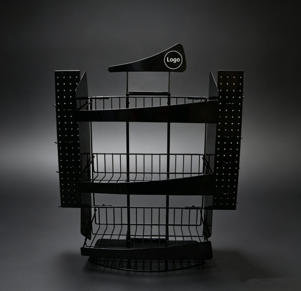 Black metal retail display rack with three-tier wire baskets, pegboard side panels, and custom logo header